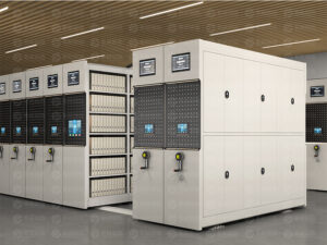 Light grey smart electric mobile shelving system with standard single-section side panel design, featuring dual touchscreen control interface with larger display screen and blue touchscreen panel, with dual-control system including front smart electric interface and rear manual backup crank for intelligent archive storage.