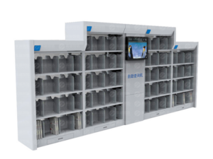 Light grey intelligent stepped bookshelf system with self-service inquiry kiosk, featuring multiple shelf compartments and digital screen for library and archive storage.